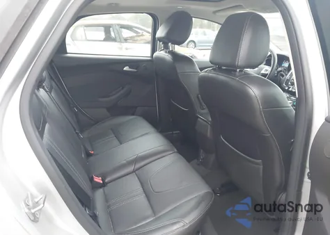 2014 Ford Focus Titanium из США, поврежденный, VIN 1FADP3N24EL269770